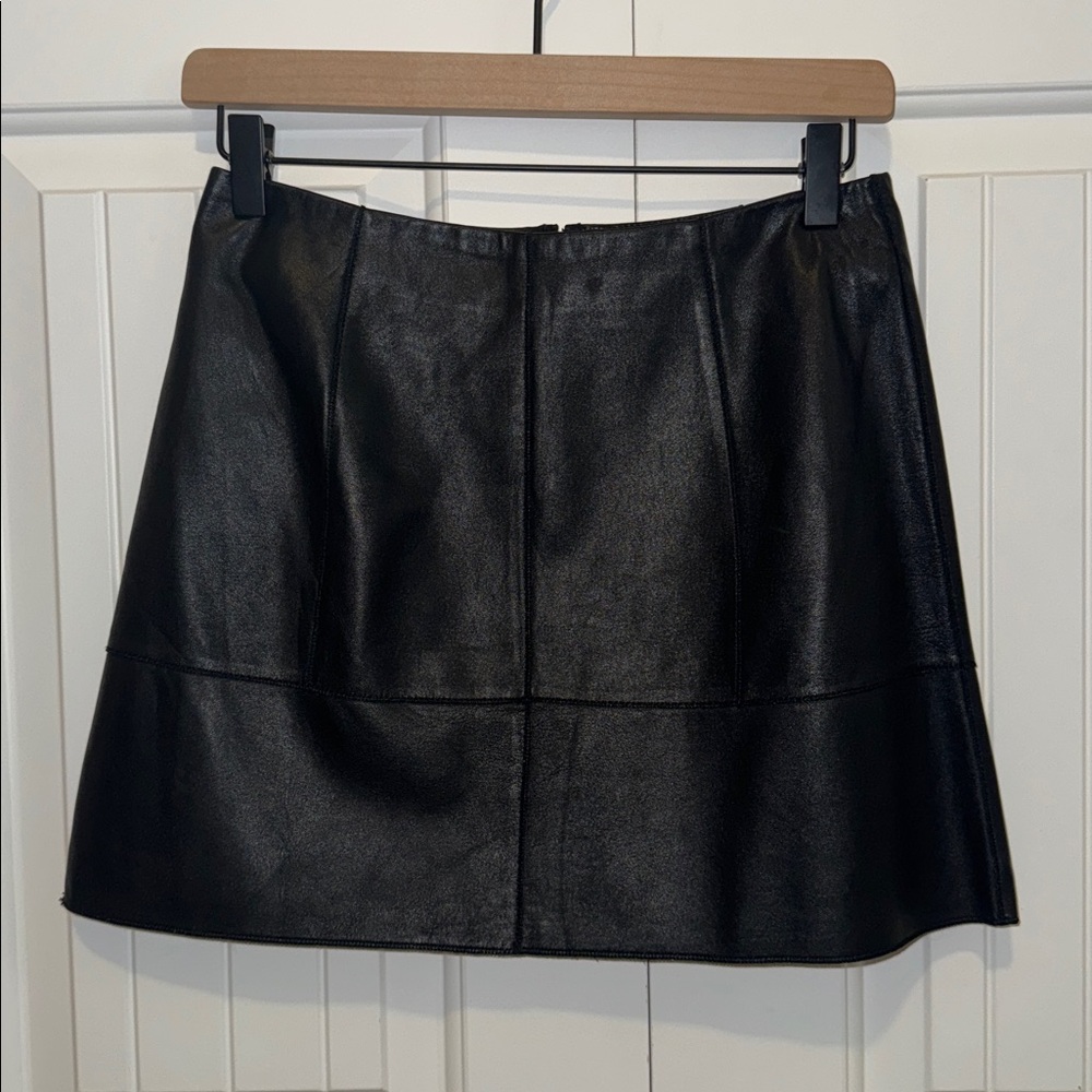 Bebe Genuine Leather mini skirt in Black